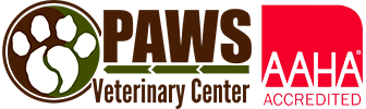 Logo featuring a brown and white paw print with "PAWS Veterinary Center" text. To the right, a red box with "AAHA Accredited" in white text, highlighting our commitment as a trusted vet facility.